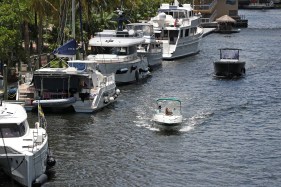 Multiple agencies are investigating the source of an oil spill that appeared early Monday in the New River near downtown Fort Lauderdale, law enforcement officials said.