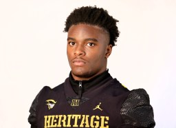American Heritage running back Byron Louis poses for an All-County photo on Dec. 13. Louis, a four-star prospect, is considering the Hurricanes, among other schools. (Carline Jean/South Florida 蜜兔直播)