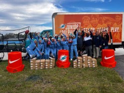 The Miami Dolphins partnered with Nike to donate equipment and apparel to the Dr. Joaquin Garcia High School girls' flag football program during a recent visit to the school in western Lake Worth. 